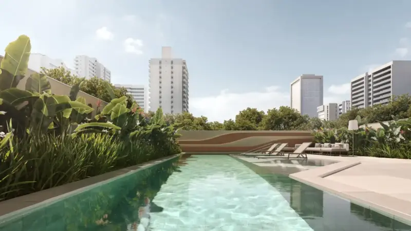 Piscina com deck e paisagismo